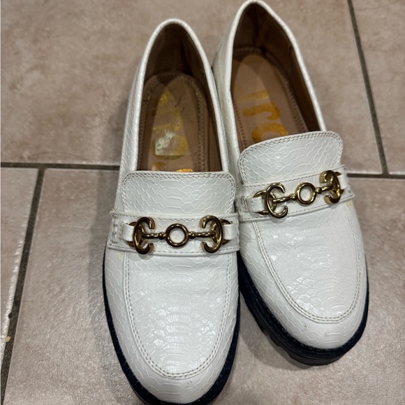 White Textured Loafers with Gold Accents - Picture 1 of 5